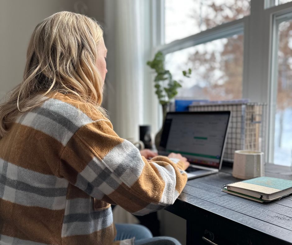 Lindsay Van Voorst working at her computer